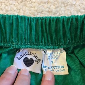 Smak Parlour Plus Size Green Corduroy & Bunny Pocket Mini Skirt | Hot Topic